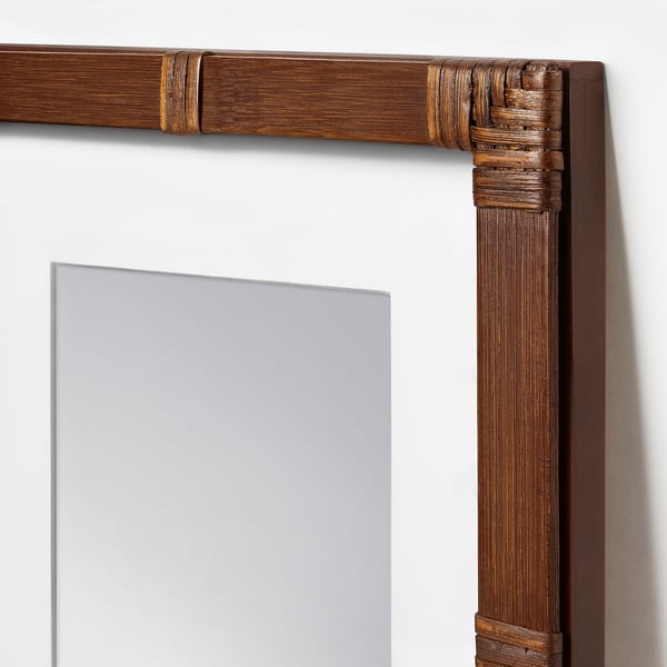 Bamboo frame with rattan wrap, acacia edge, protective cover, versatile display.