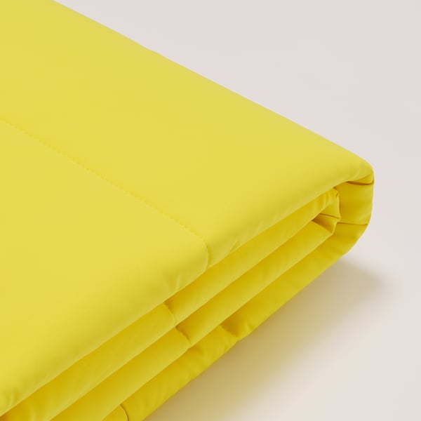 Bright yellow fabric, smooth, neatly folded, showcasing quality, vibrant colour, and fine stitching.