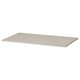 A KOMPLEMENT shelf in light colour, made of particleboard and paper foil, designed for a pax wardrobe.