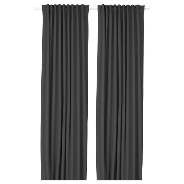 Two dark grey curtains hang side by side, featuring a smooth, textured fabric and discreet eyelet design, offering a sleek and modern look.