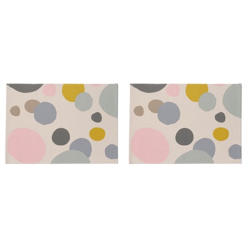 Two rectangular place mats with multicoloured abstract circles.