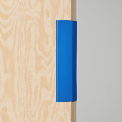 Blue LÄTTHET handle, slim rectangular shape, attached to wooden surface, minimalistic design, small size.