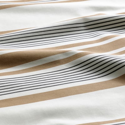 Striped pillowcase in beige tones; one side thin stripes, the other wide ones. Soft fabric, quality cotton-viscose blend.