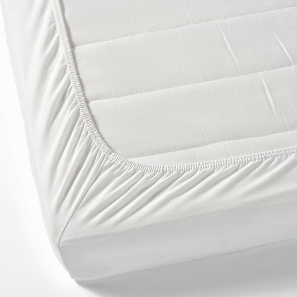 Fitted sheet with elastic edge, securing for childrens mattress.