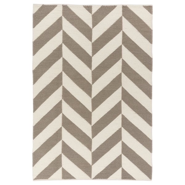 Beige and grey chevron-patterned wool rug with cotton backing.