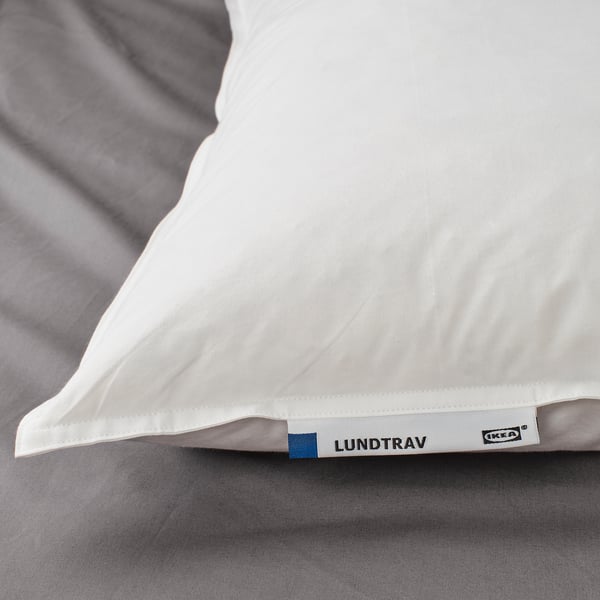 LUNDTRAV IKEA pillow: soft, supportive, cotton cover.