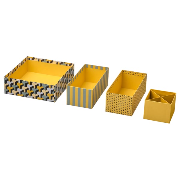 Four yellow storage boxes: two patterned, two plain yellow. Square, rectangular shapes. Made from recycled paperboard. Perfect for organising items.