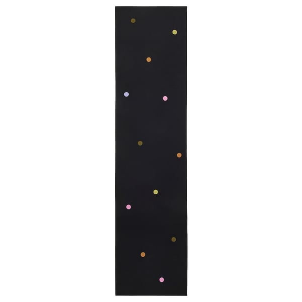 A black IKEA MÄVINN cotton runner with multicoloured crochet dots.