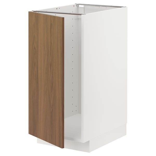 A white METOD kitchen cabinet with a single modern walnut door.