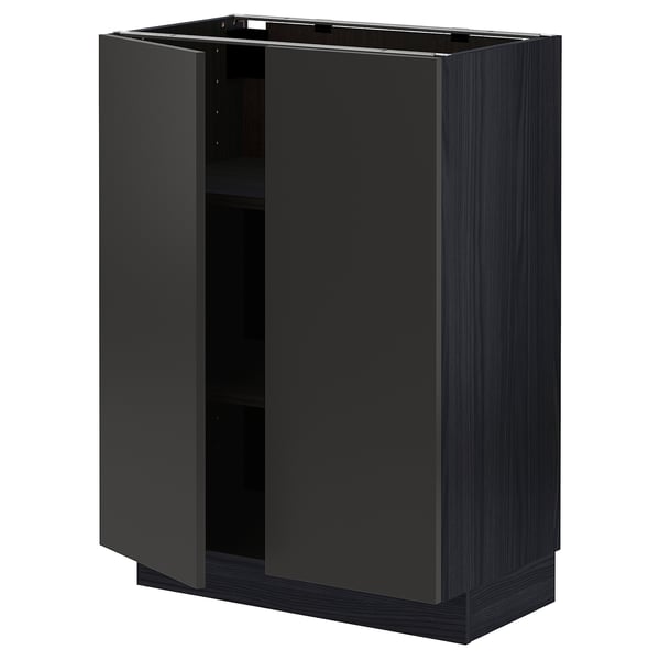 Black METOD cabinet, modern design, rectangular shape, with one open door.