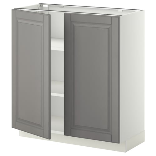 This image shows a grey, ikea METOD kitchen cabinet with two open doors, featuring beveled edges and adjustable shelves.