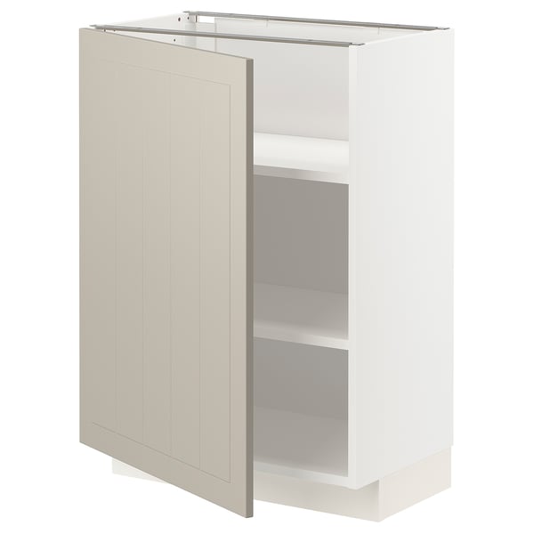 A white METOD kitchen cabinet with beige doors, featuring two adjustable shelves, and a modern minimalist design.