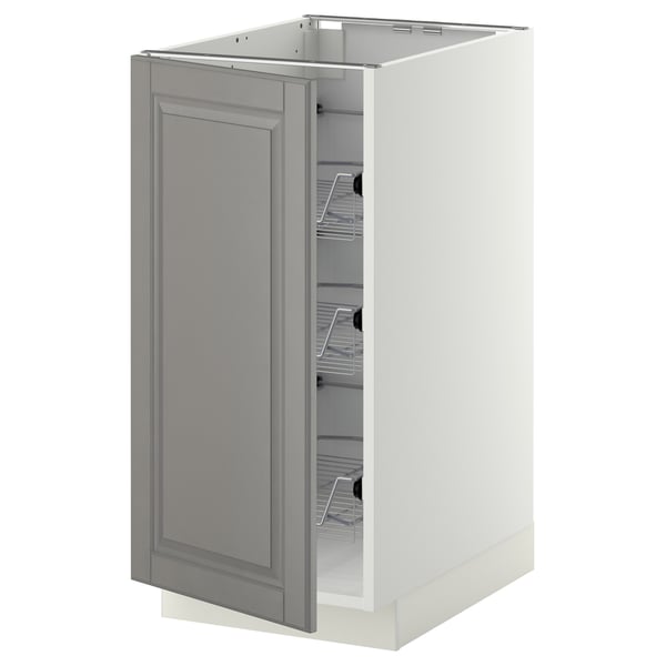 A grey METOD kitchen cabinet with a bevelled door and pull-out wire baskets.