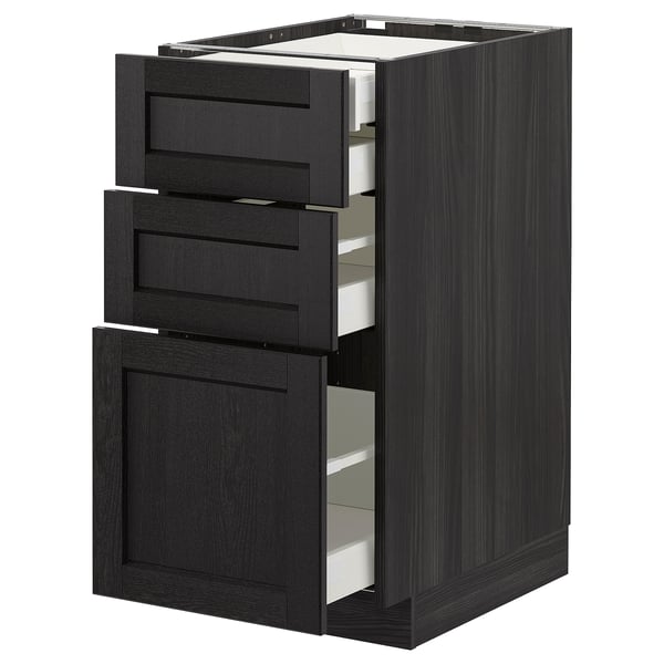 Black stained wooden kitchen cabinet with three open drawers, modern bevelled design.