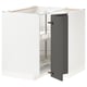 A white METOD kitchen unit with a grey door, featuring a carousel shelf inside.