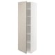 A white METOD kitchen cabinet with beige stensund doors, featuring a frame construction, adjustable shelf, and snap-on hinges.