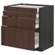 Dark brown wooden kitchen unit with multiple drawers, sleek handles, and a modern design.