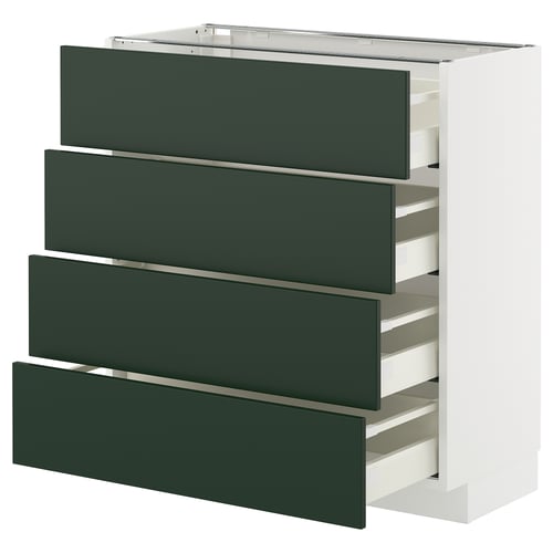 A white and dark green drawer unit from the METOD kitchen system. It four deep green pull-out drawers. The design is modern with sleek lines.