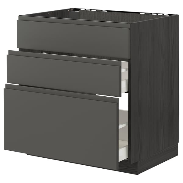 Dark grey METOD modular kitchen cabinet with three drawers.