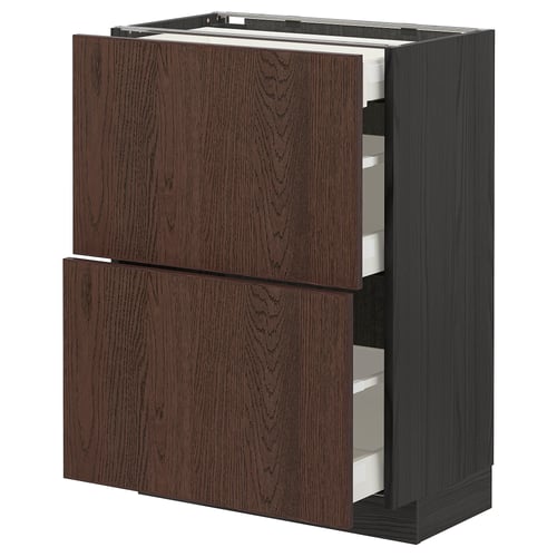 Brown wooden kitchen cabinet with two open drawers, dark finish.