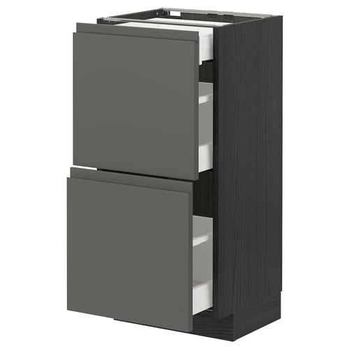 Modern dark grey ikea METOD kitchen cabinet with handles and drawers.