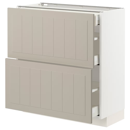 White-beige METOD kitchen unit with beige stensund fronts, featuring wooden panels, rectangular shape, and multiple drawers.
