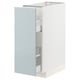 White METOD cabinet with blue-gray door, modern kitchen storage unit.