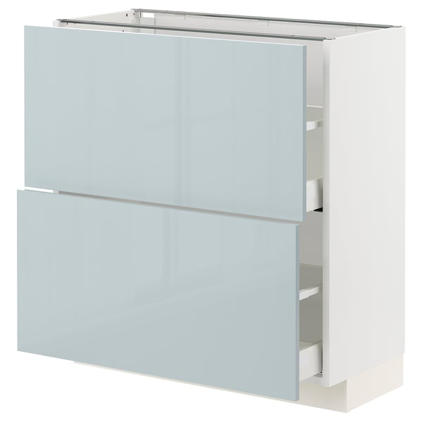 Modern white METOD kitchen cabinet with grey-blue glossy drawers and doors.