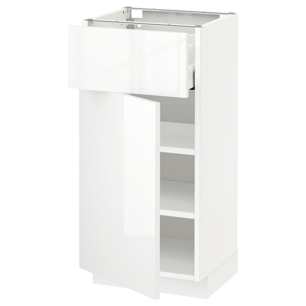 Modern white gloss kitchen unit with two shelves and a drawer.