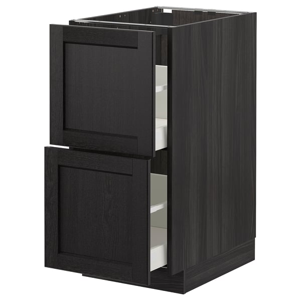 Black kitchen cabinet with two open drawers, sleek design, modern finish.