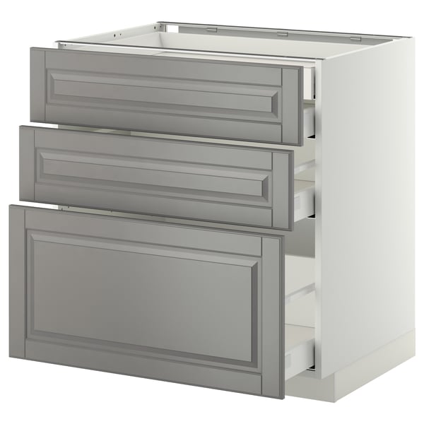 Soft grey METOD kitchen cabinet with three bevelled drawers.