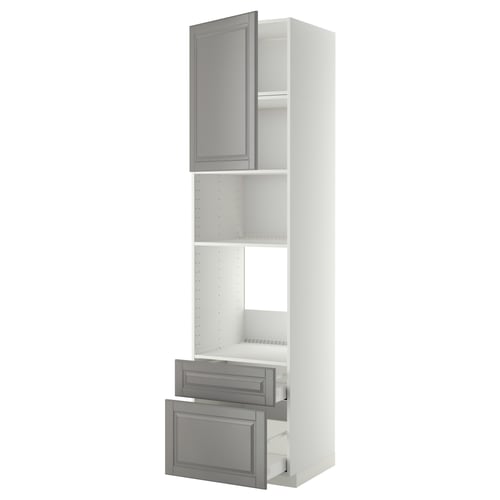 A white METOD kitchen cabinet with grey bodbyn handles. It an open door at the top, two pull-out drawers below, and adjustable shelves inside.