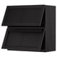 Black kitchen cabinet with bevelled edges, sleek and modern design.