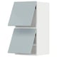 METOD kitchen units in blue-gray gloss. Two stacked cabinets with open doors.