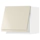 A white high-gloss kitchen wall cabinet with a sleek, angular design and integrated handles.
