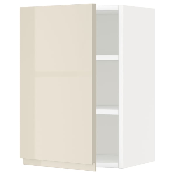 METOD wall cabinet in high gloss beige with adjustable shelf.