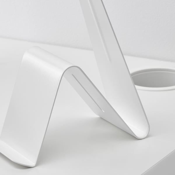 White metal stand, sleek minimalist design, part of modern furniture series.