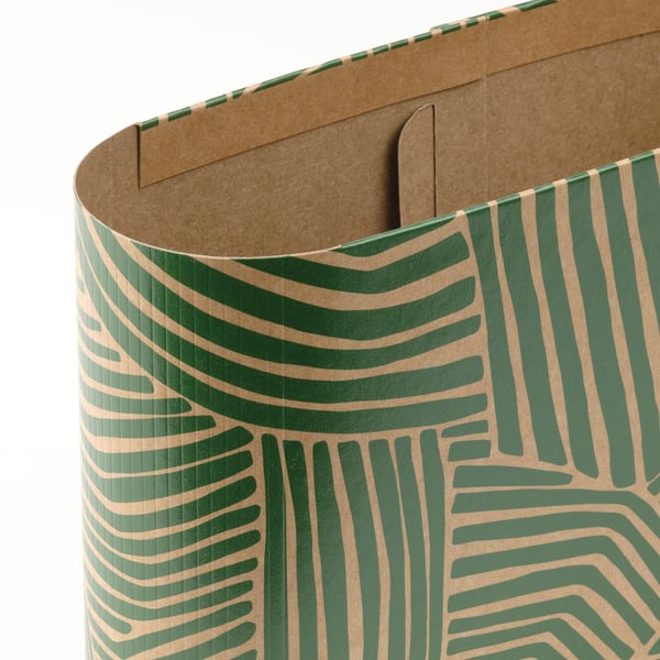Cardboard napkin holder with green palm pattern, open top, sturdy design.