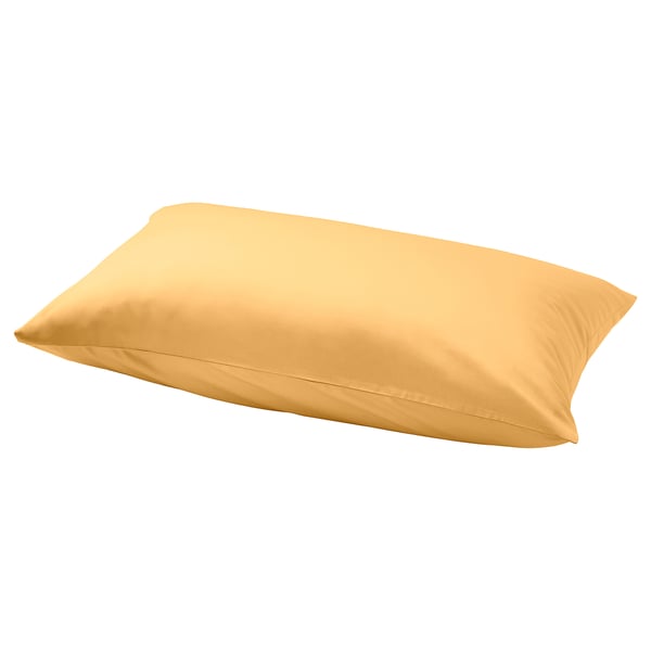 A golden yellow pillowcase, smoothly silk-like, rectangle-shaped with an envelope closure design, made from 60% cotton and 40% lyocell.