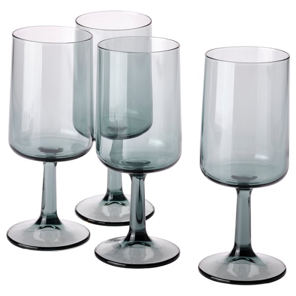Four gray-blue OMBONAD wine glasses, elegant with thin stems and rounded tops, arranged in a neat row.