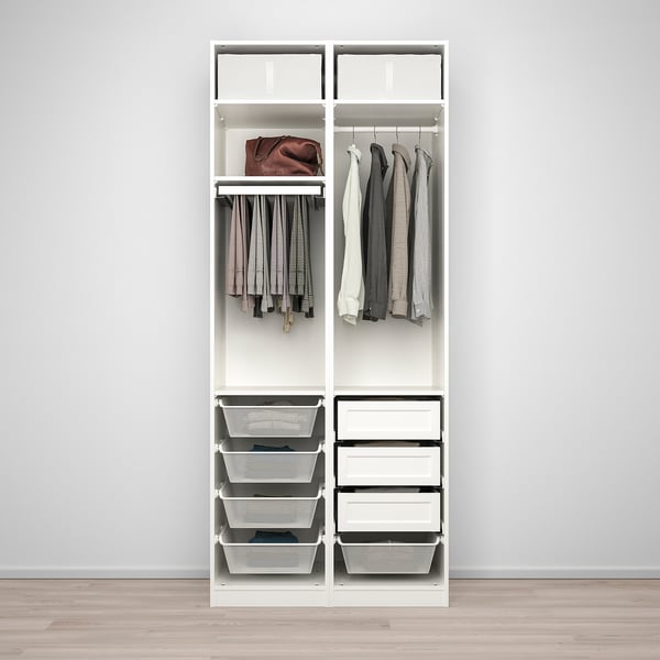 A PAX wardrobe with drawers, hanging space, and mesh baskets for organised clothing storage.