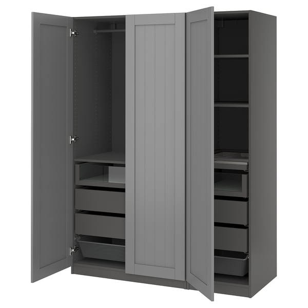 An open grey PAX wardrobe with drawers and shelves.