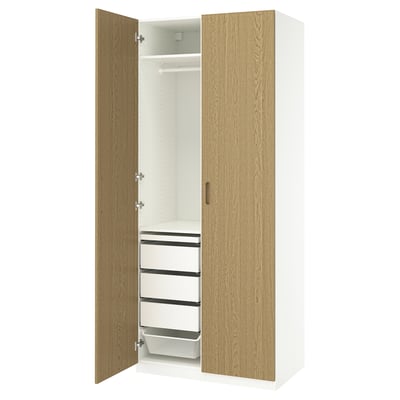An open p. A. X. Wardrobe in white and oak, featuring drawers and shelves.