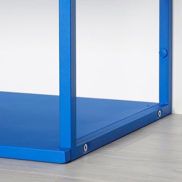 Bright blue modern shelving unit, tightly assembled with sturdy metal bolts, standing on wooden floor.