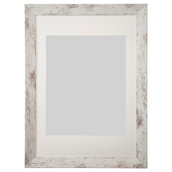 A PLOMMONTRÄD frame in white with a rustic texture, featuring a rectangular shape with a plastic front protection.