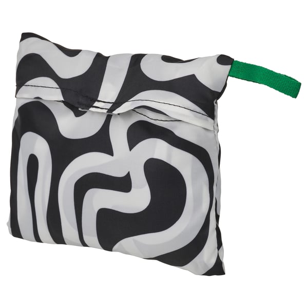 Black & white patterned pouch with green handle, recycled polyester, rectangular.