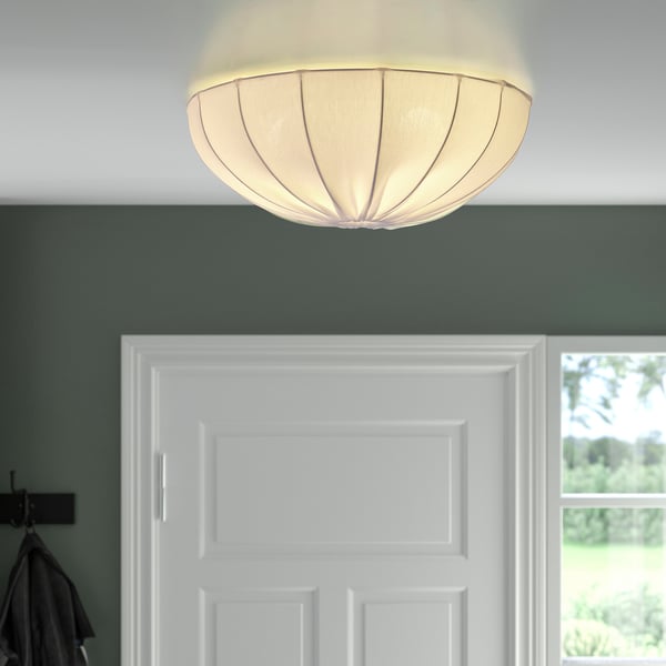 Soft light ceiling lamp in light hallway.