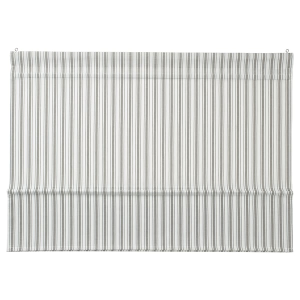 Striped roller blind, recycled polyester, adjustable with magnets.