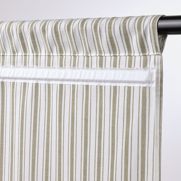 Striped privacy blind with slot heading, adjustable to several heights via magnets, suitable for various rooms including bathrooms.