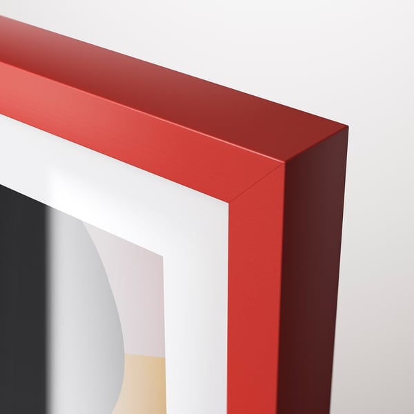A sleek red picture frame with crisp edges and sturdy design, prominently displaying a colourful abstract image.